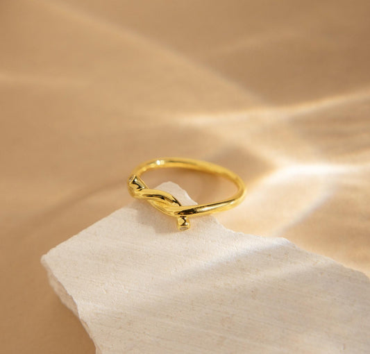 Gold Love Knot Ring with Diamonds