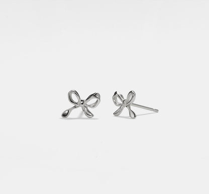 Tiny Gold Bow Stud Earrings in Silver