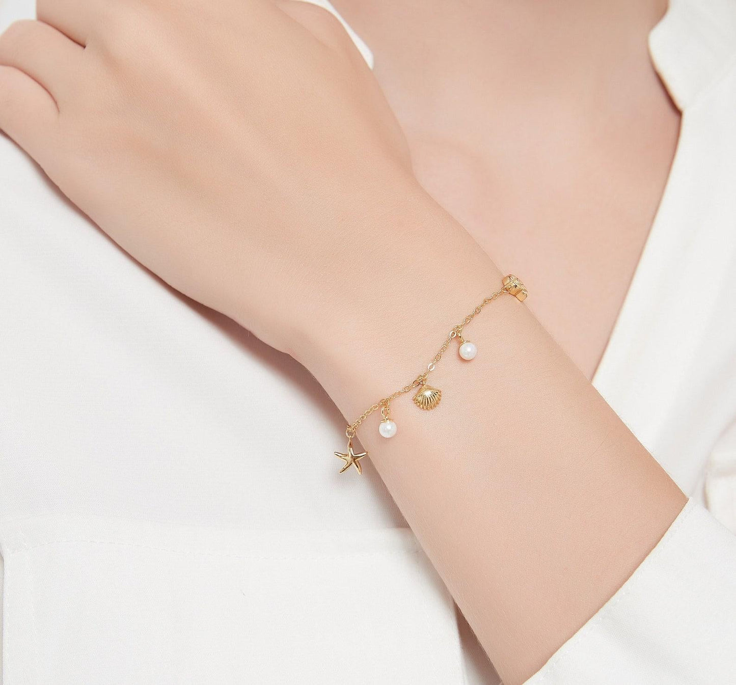 Seashell Starfish Charm Bracelet in Gold Plated Silver